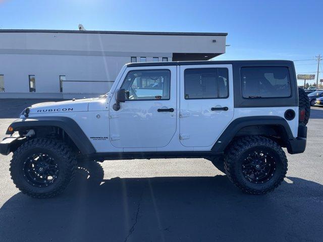 used 2012 Jeep Wrangler Unlimited car, priced at $15,987