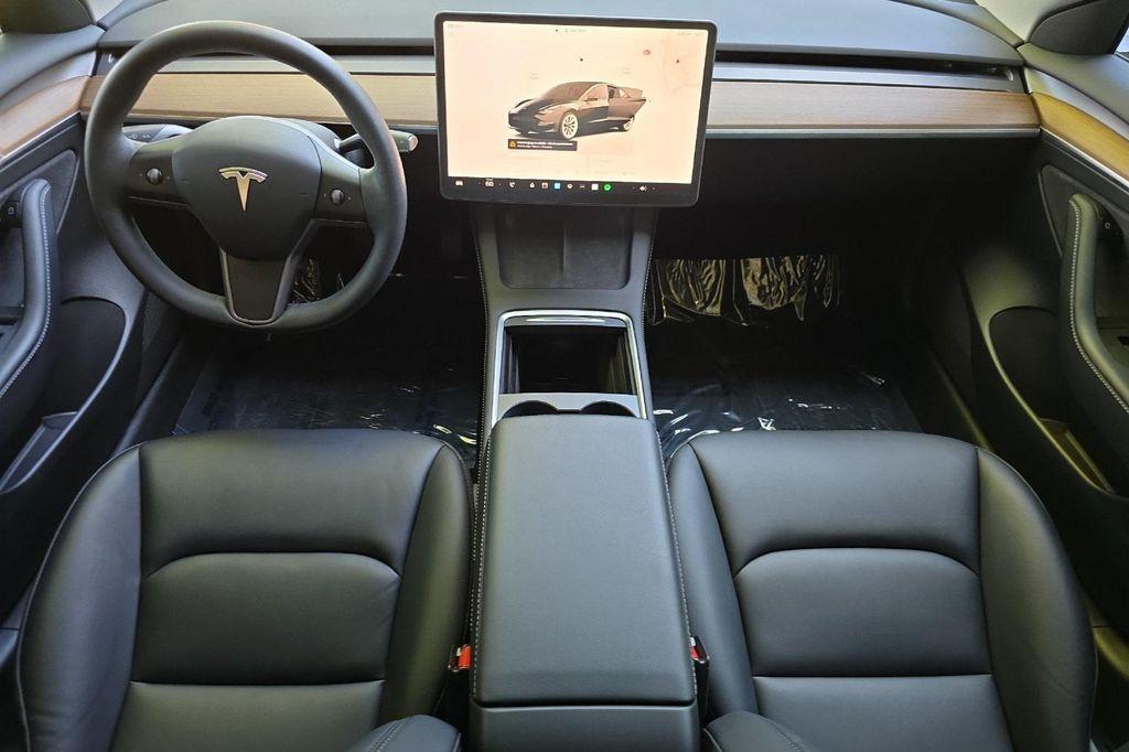 used 2023 Tesla Model 3 car, priced at $27,245