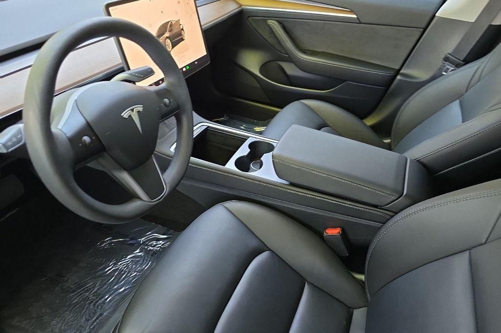 used 2023 Tesla Model 3 car, priced at $27,245