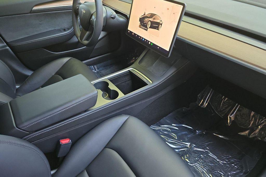 used 2023 Tesla Model 3 car, priced at $27,245