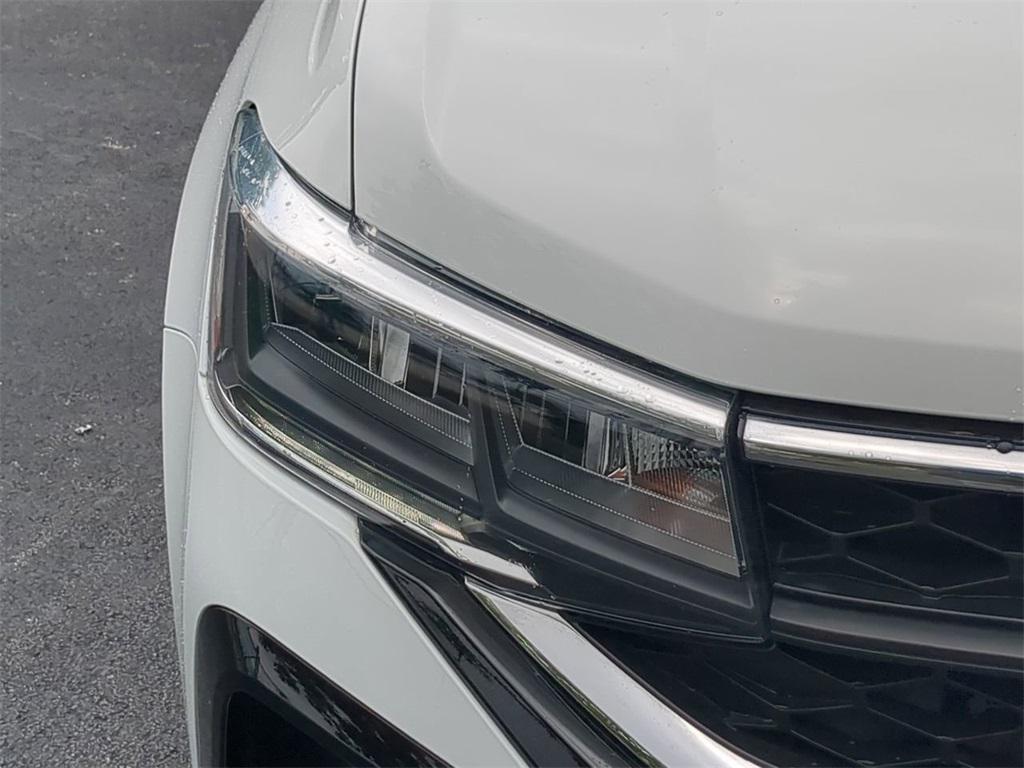 used 2024 Volkswagen Taos car, priced at $24,165