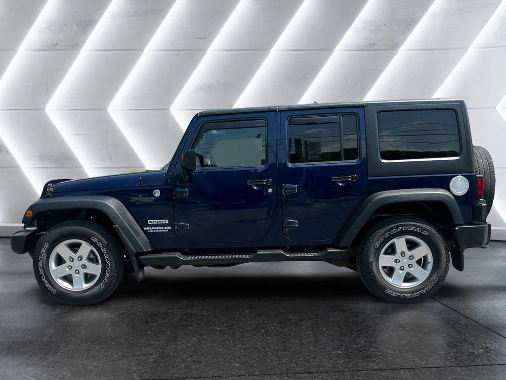 used 2013 Jeep Wrangler Unlimited car, priced at $13,980
