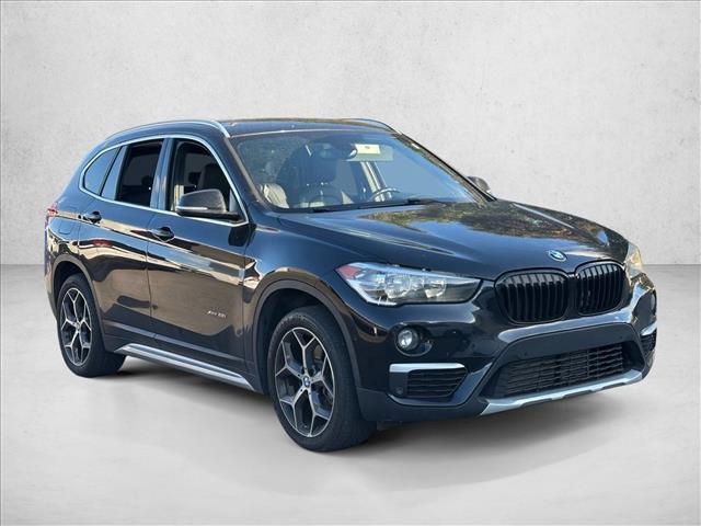 used 2018 BMW X1 car, priced at $17,103