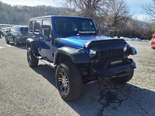 used 2010 Jeep Wrangler Unlimited car, priced at $14,990