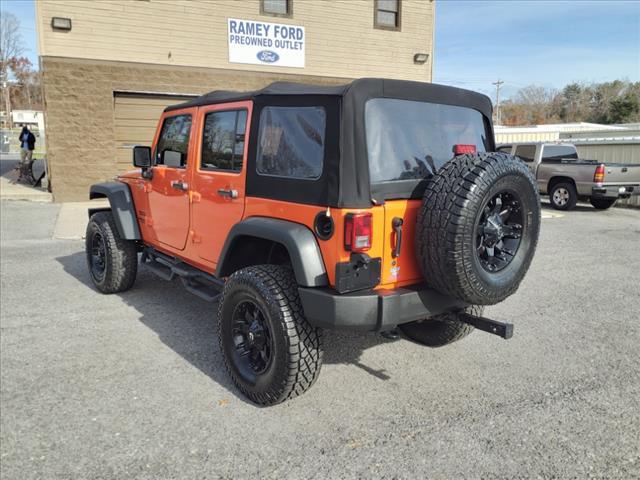 used 2015 Jeep Wrangler Unlimited car, priced at $16,990