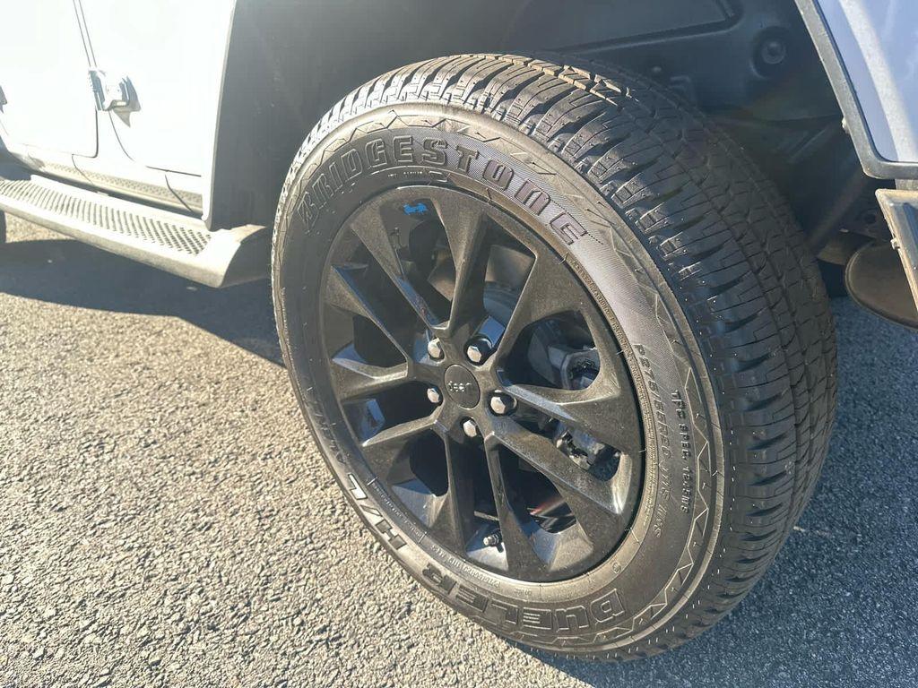 used 2023 Jeep Wrangler 4xe car, priced at $32,675