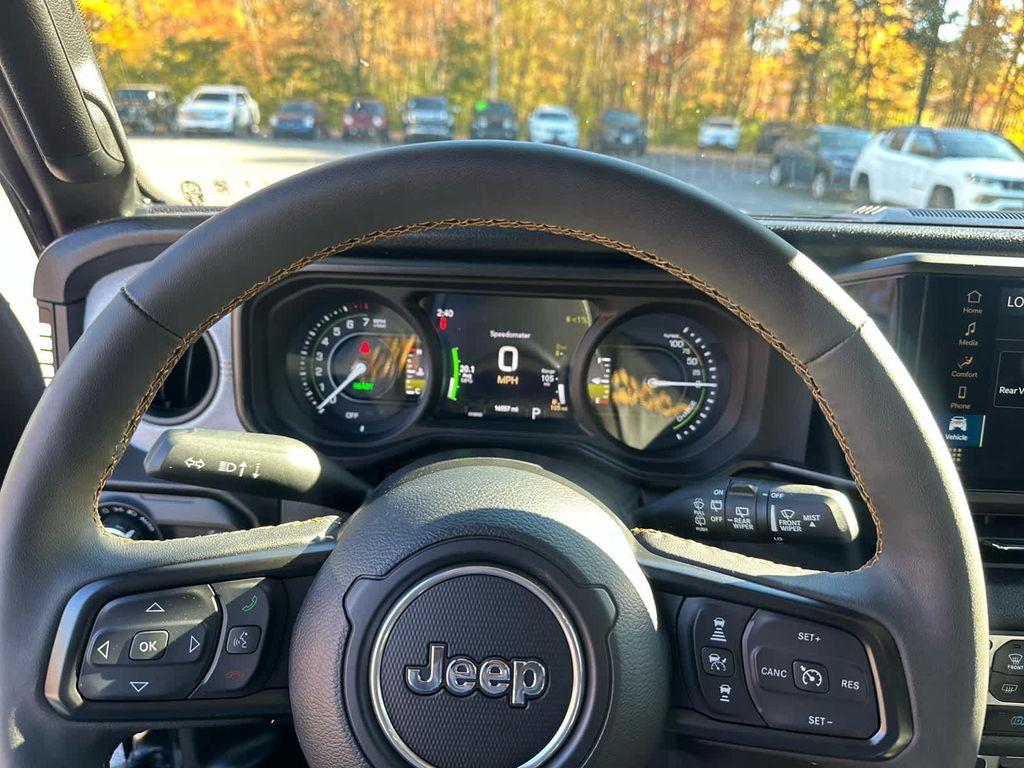 used 2024 Jeep Wrangler 4xe car, priced at $33,525