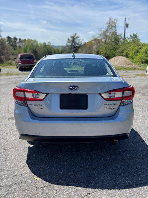 used 2022 Subaru Impreza car, priced at $16,999