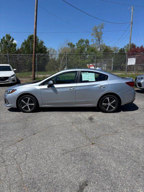used 2022 Subaru Impreza car, priced at $16,999