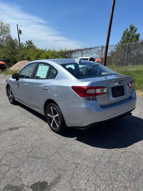 used 2022 Subaru Impreza car, priced at $16,999