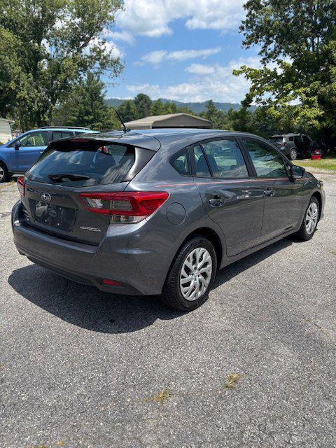 used 2022 Subaru Impreza car, priced at $16,999