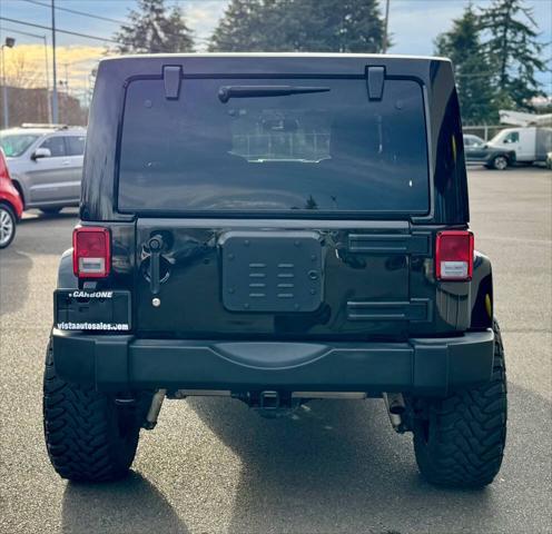 used 2016 Jeep Wrangler Unlimited car, priced at $23,999