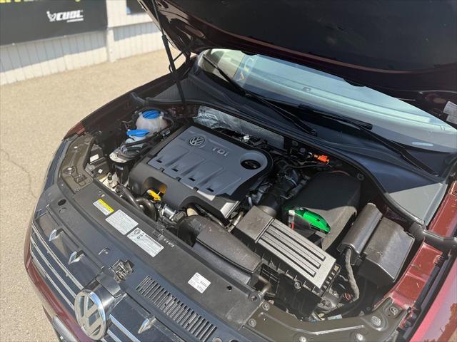 used 2014 Volkswagen Passat car, priced at $7,999
