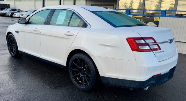 used 2015 Ford Taurus car, priced at $9,999