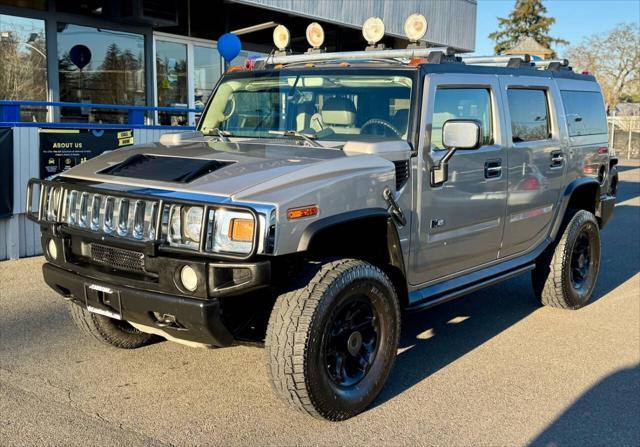 used 2003 Hummer H2 car, priced at $9,999