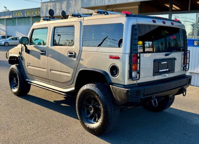 used 2003 Hummer H2 car, priced at $9,999