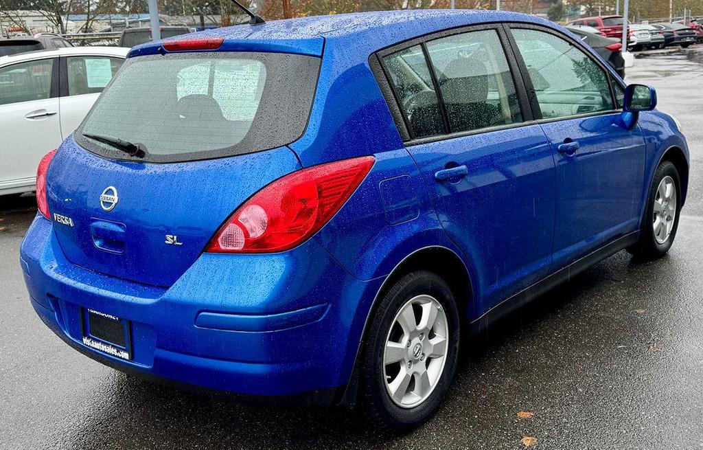 used 2009 Nissan Versa car, priced at $5,499