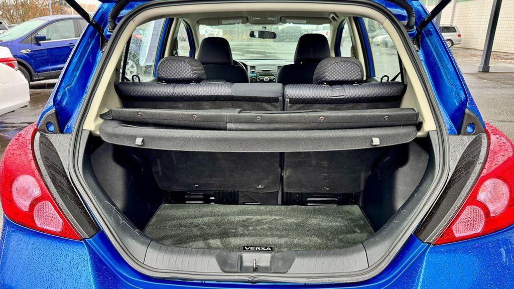 used 2009 Nissan Versa car, priced at $5,499