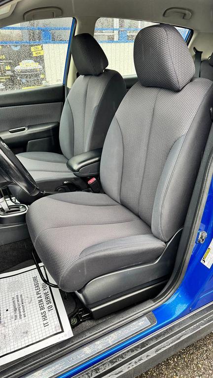 used 2009 Nissan Versa car, priced at $5,499