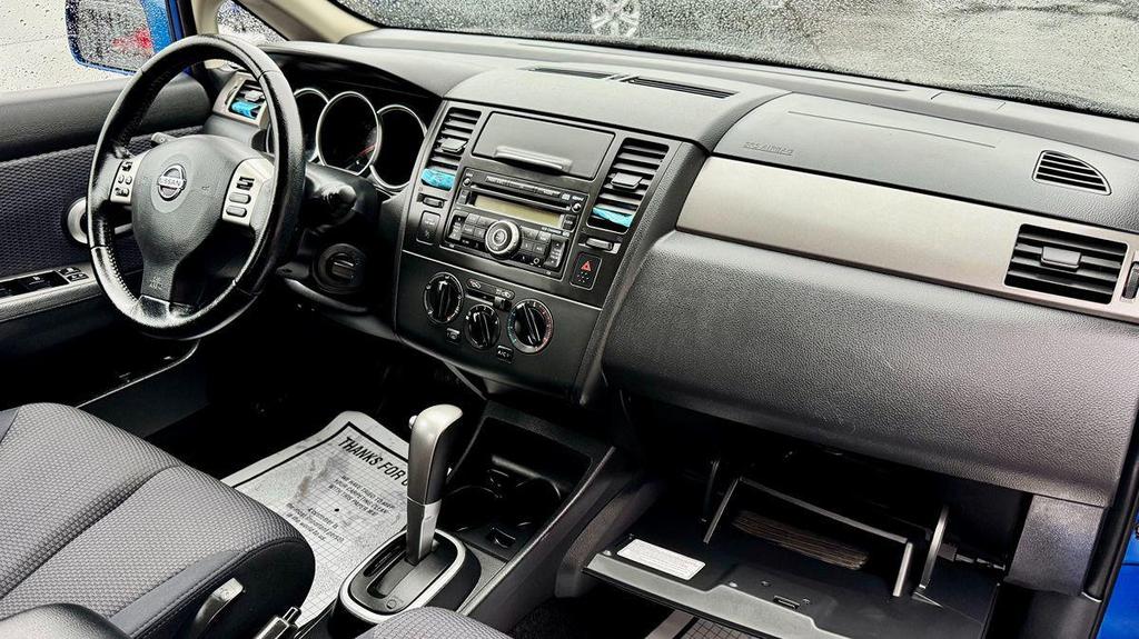 used 2009 Nissan Versa car, priced at $5,499