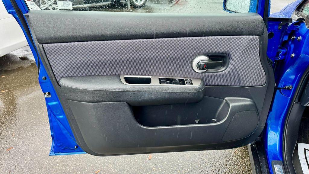 used 2009 Nissan Versa car, priced at $5,499