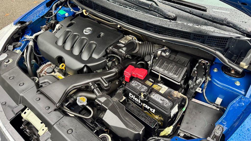 used 2009 Nissan Versa car, priced at $5,499