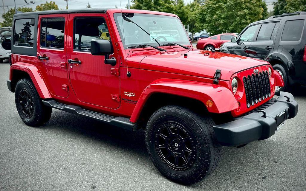 used 2013 Jeep Wrangler Unlimited car, priced at $9,999