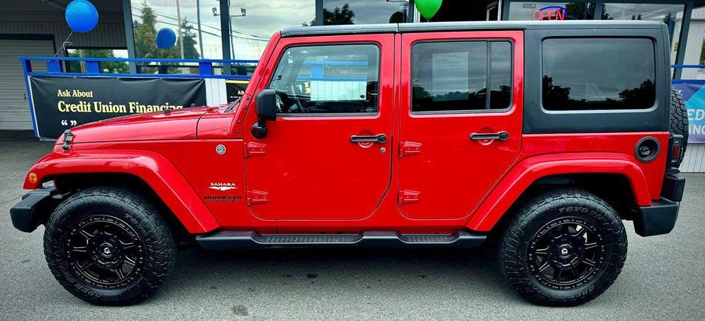 used 2013 Jeep Wrangler Unlimited car, priced at $9,999
