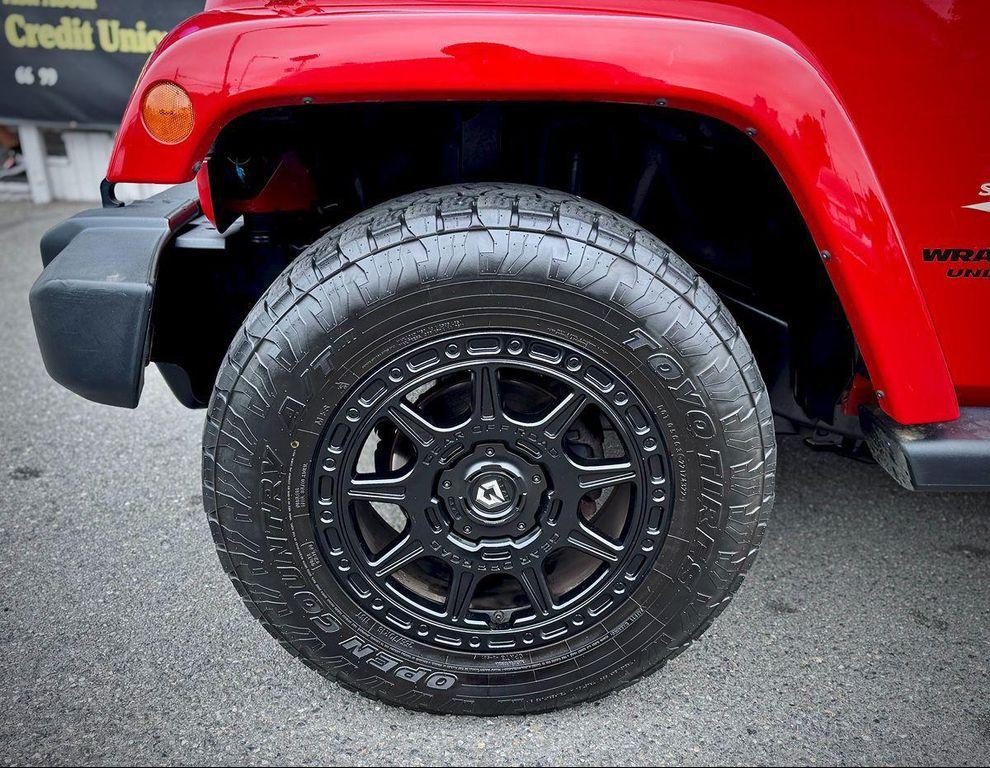 used 2013 Jeep Wrangler Unlimited car, priced at $9,999