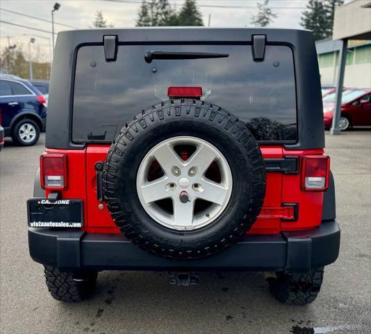 used 2014 Jeep Wrangler Unlimited car, priced at $14,999