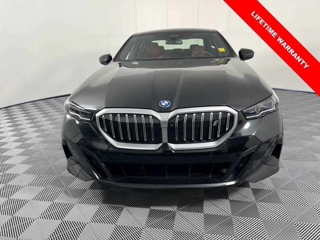 used 2024 BMW i5 car, priced at $51,903
