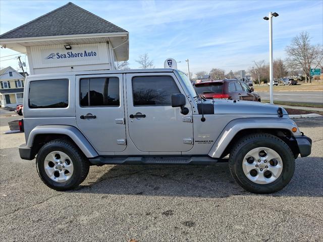 used 2013 Jeep Wrangler Unlimited car, priced at $15,495