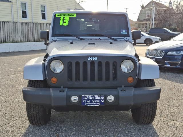 used 2013 Jeep Wrangler Unlimited car, priced at $15,495