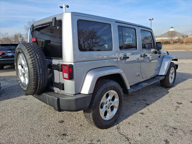 used 2013 Jeep Wrangler Unlimited car, priced at $15,495