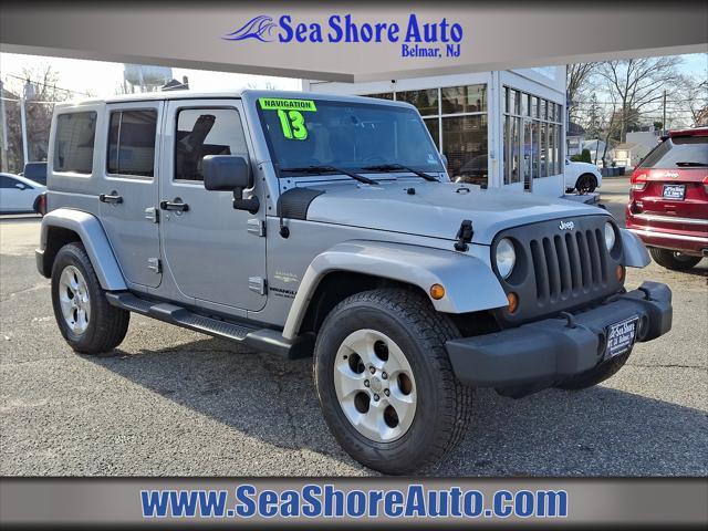 used 2013 Jeep Wrangler Unlimited car, priced at $15,995