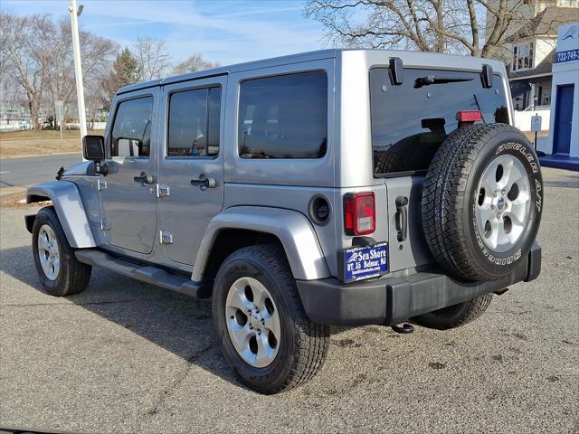 used 2013 Jeep Wrangler Unlimited car, priced at $15,495