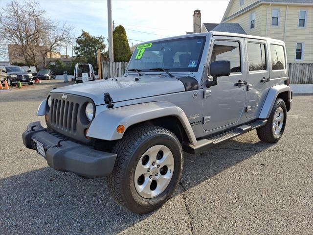 used 2013 Jeep Wrangler Unlimited car, priced at $15,495