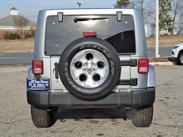 used 2013 Jeep Wrangler Unlimited car, priced at $15,495