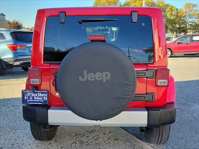 used 2011 Jeep Wrangler Unlimited car, priced at $15,995