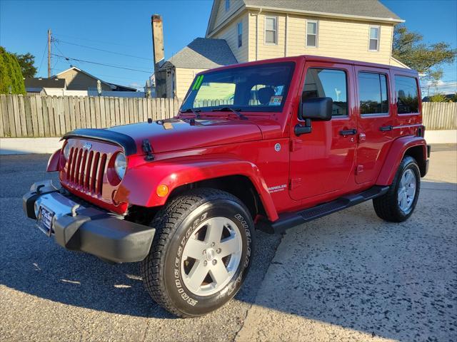 used 2011 Jeep Wrangler Unlimited car, priced at $15,995