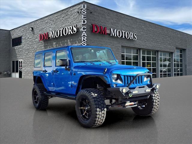 used 2016 Jeep Wrangler Unlimited car, priced at $21,995