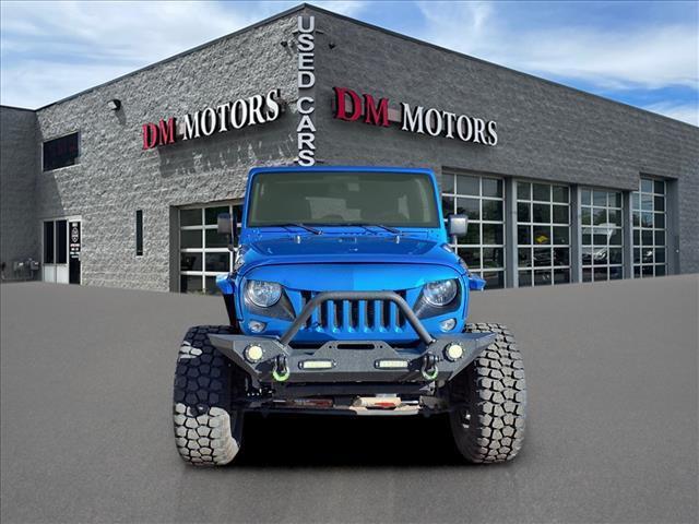 used 2016 Jeep Wrangler Unlimited car, priced at $21,995