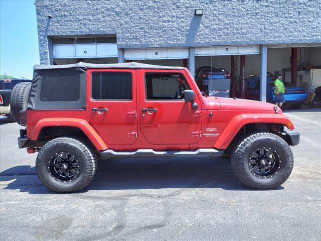 used 2011 Jeep Wrangler Unlimited car, priced at $10,995