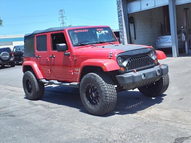 used 2011 Jeep Wrangler Unlimited car, priced at $10,995