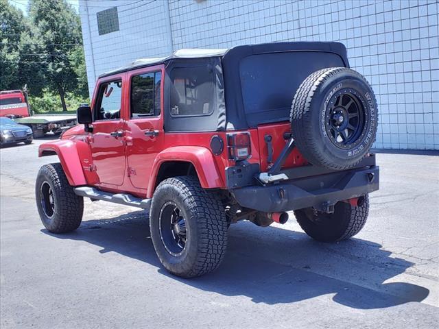 used 2011 Jeep Wrangler Unlimited car, priced at $10,995