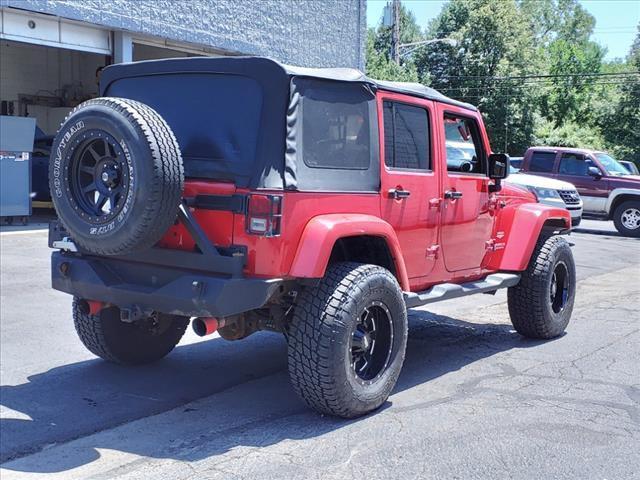 used 2011 Jeep Wrangler Unlimited car, priced at $10,995