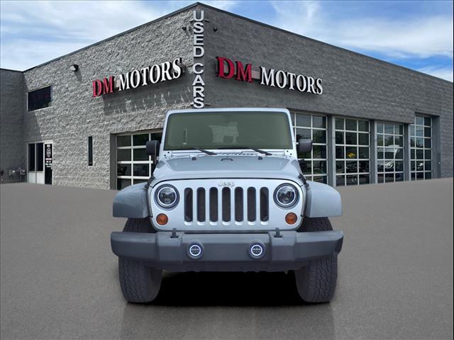 used 2011 Jeep Wrangler Unlimited car, priced at $14,995