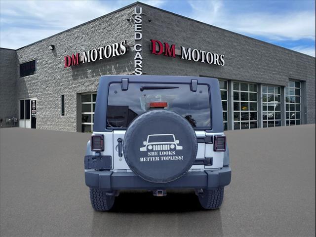 used 2011 Jeep Wrangler Unlimited car, priced at $14,995