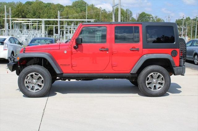 used 2015 Jeep Wrangler Unlimited car, priced at $23,495