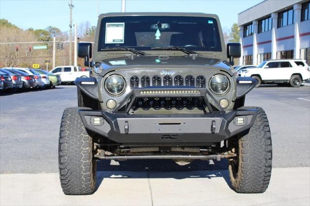 used 2015 Jeep Wrangler Unlimited car, priced at $16,995